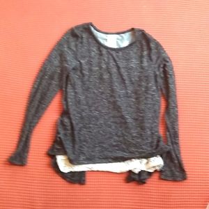 Black shirt with white layer underneath